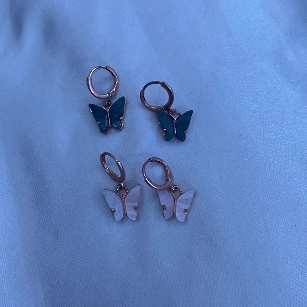 Pack of two butterfly earrings gold white and black